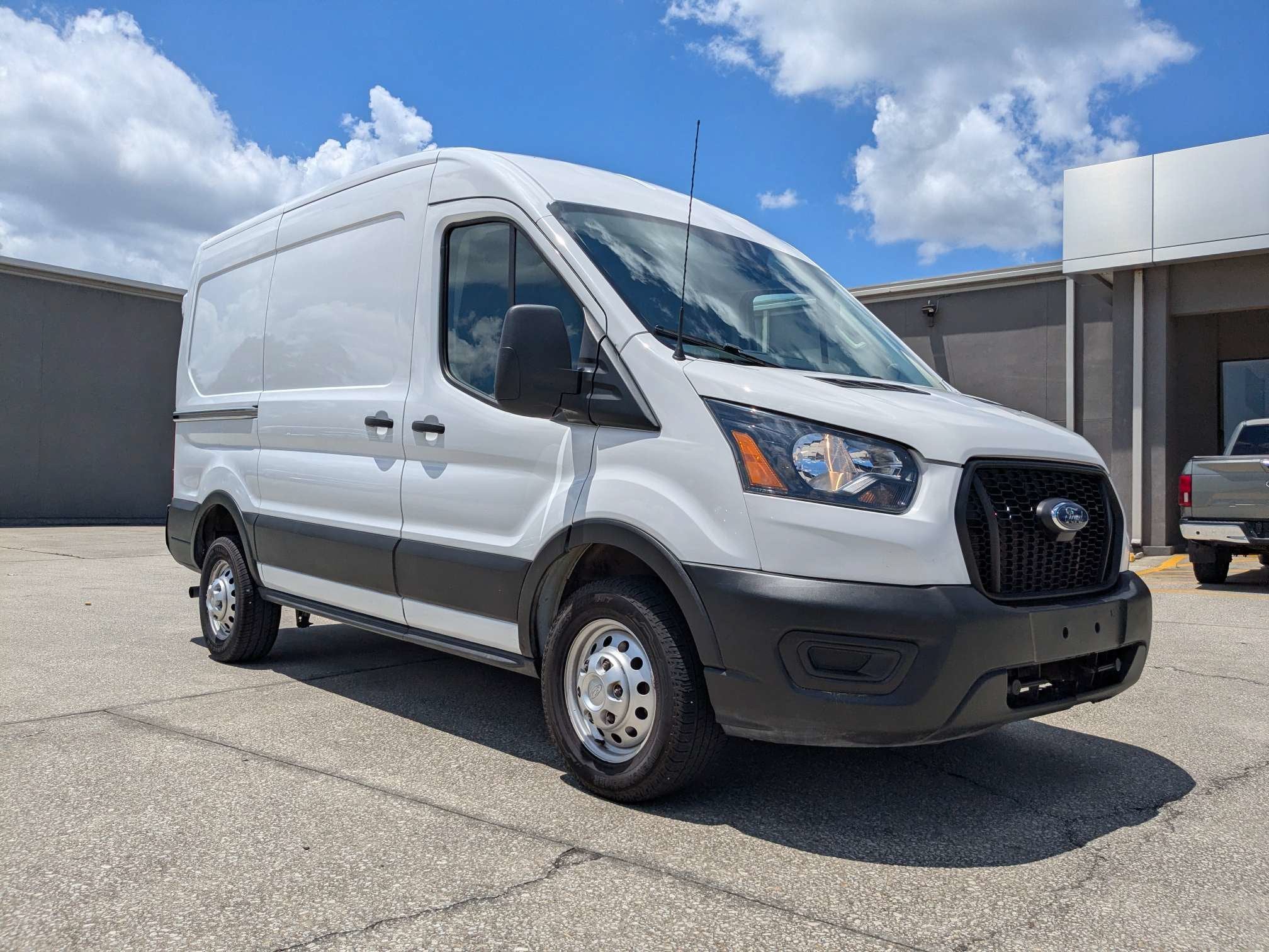 2023 Ford Transit Cargo Van T-250 130" Med Rf 9070 GVWR AWD