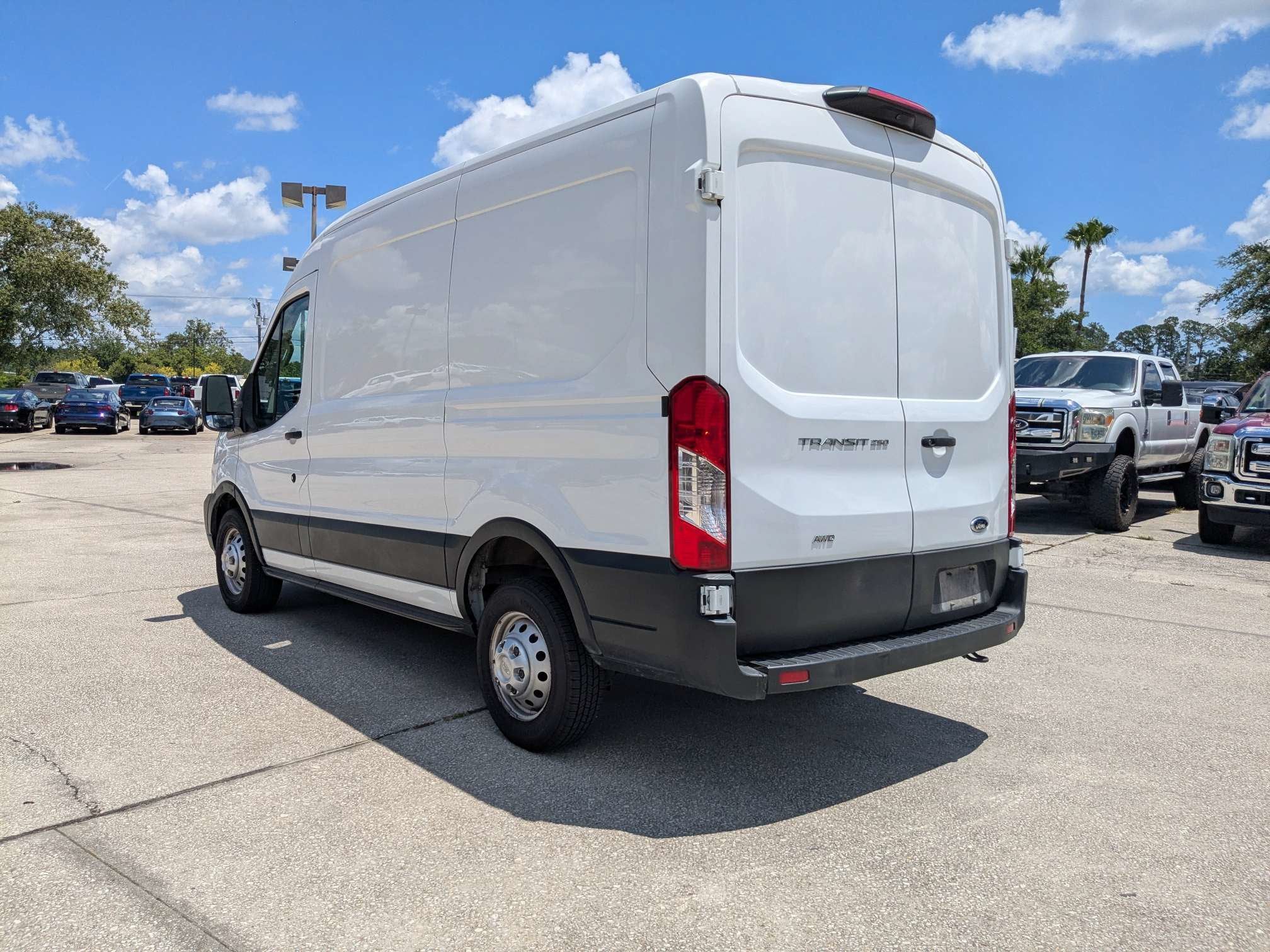 2023 Ford Transit Cargo Van T-250 130" Med Rf 9070 GVWR AWD