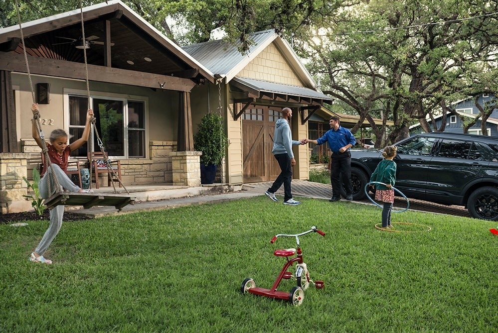 Ford employee picks up a car | Paul Clark Ford, Inc. in Yulee FL